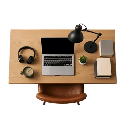 Office desk, laptop, headphones, coffee mug